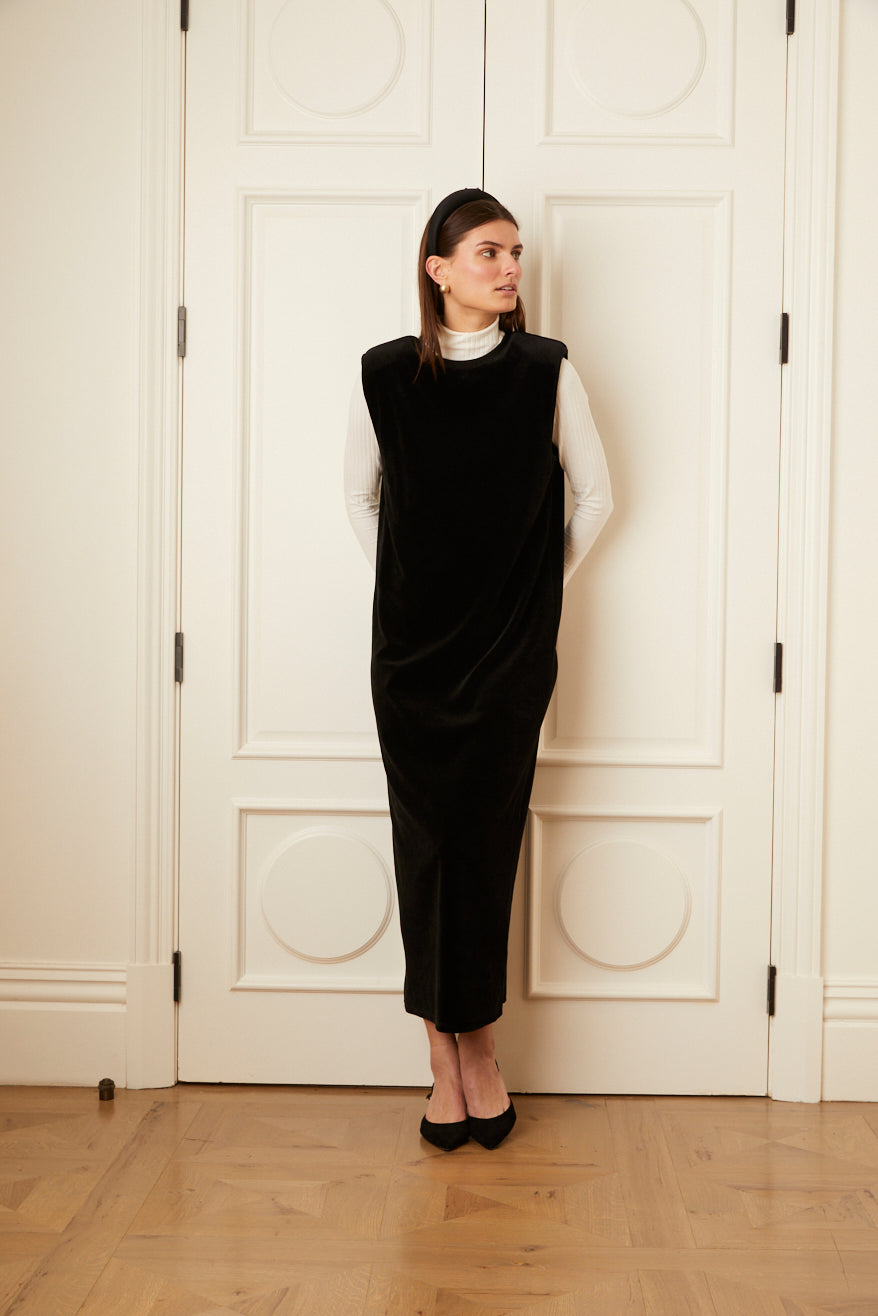 Model wearing the black Sleeveless Velour A-Line Maxi Dress.