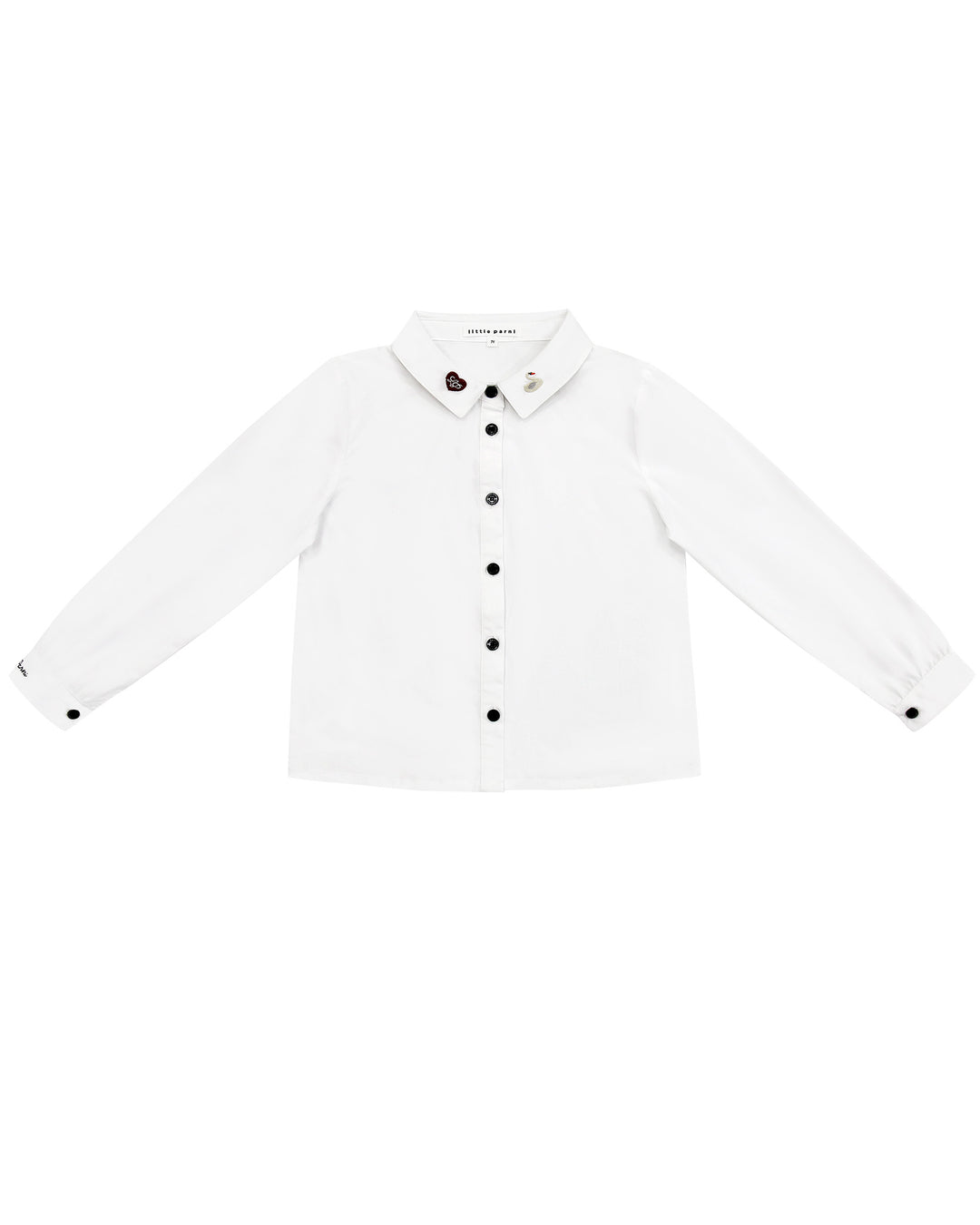 White shirt with black buttons on a white background
