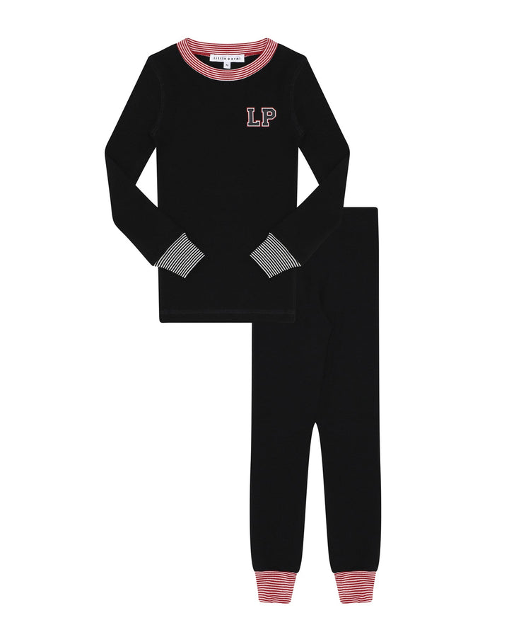 Black pajama set with red and white accents on a white background