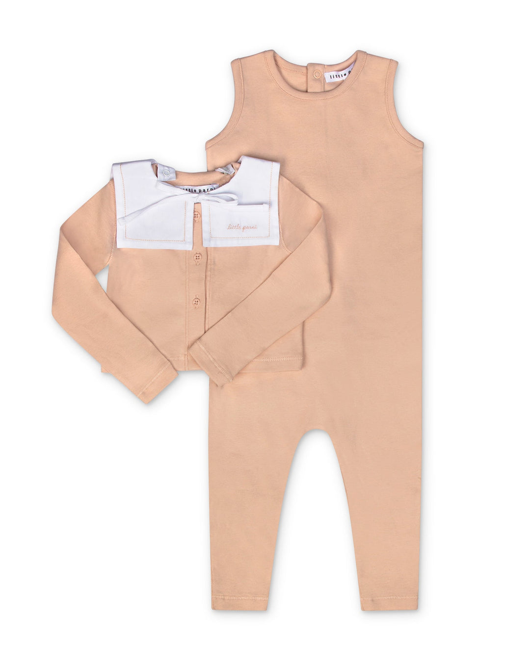 Beige baby romper with white shirt on a white background