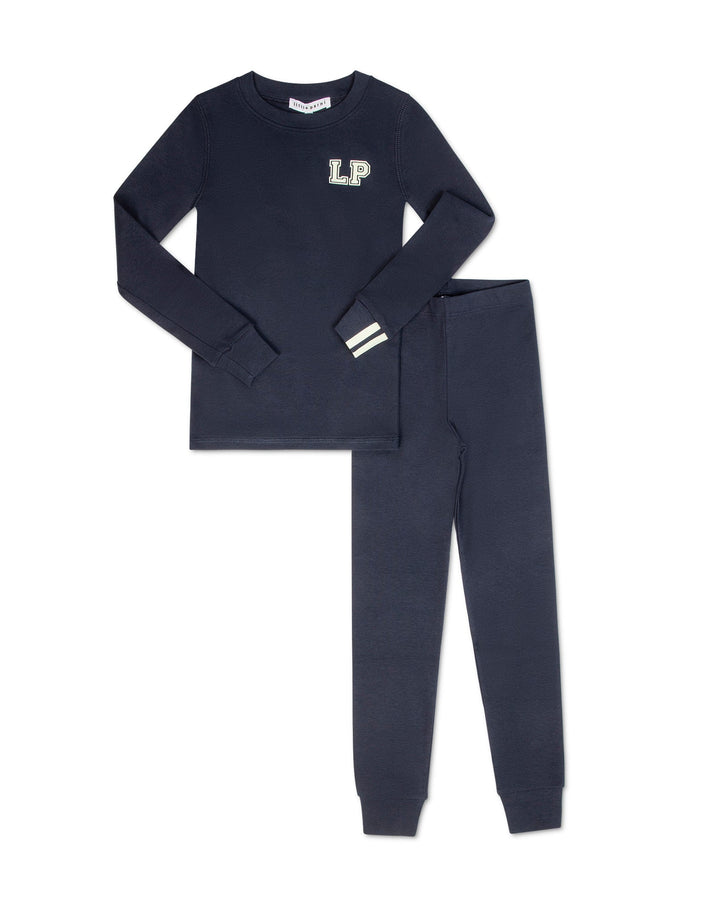 Navy pajama set with long-sleeve top and pants on a white background