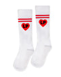 White socks with red heart designs and 'LP' initials on a white background