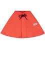 Orange skirt with a brand logo on a white background