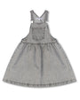 Gray denim pinafore dress on a white background