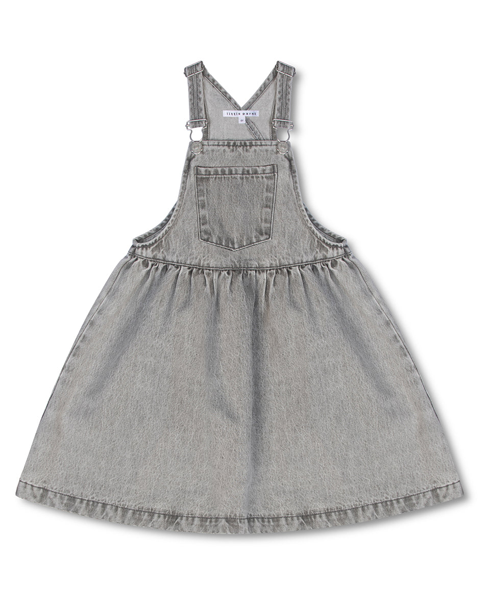 Gray denim pinafore dress on a white background