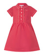 Red dress with white buttons on a white background