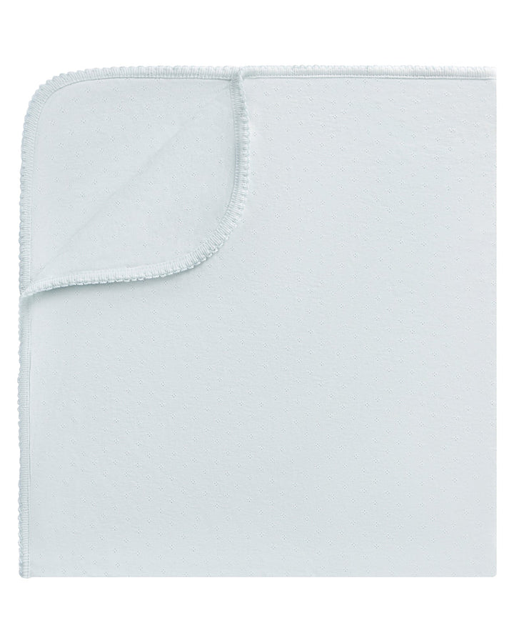 Light blue blanket on a white background