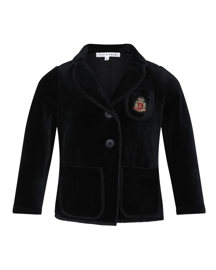 Black Velour blazer with a crest on a white background.