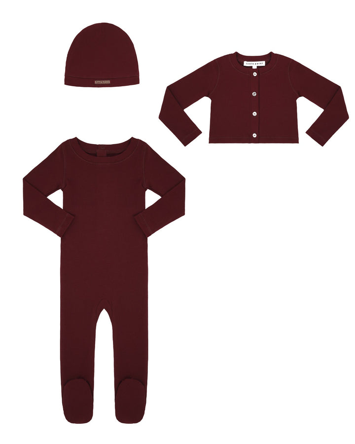 Maroon baby outfit set with onesie, cardigan, and hat on a white background