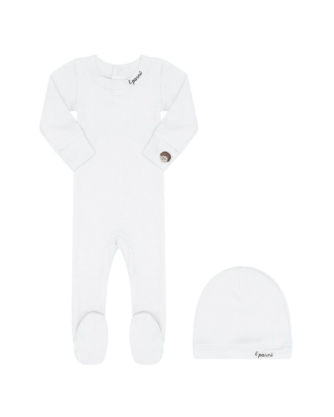 White baby onesie and hat set on a white background