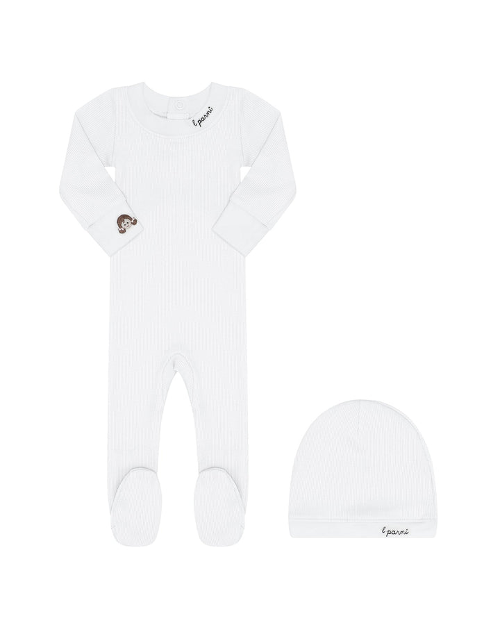 White baby onesie with footies and matching hat on a white background