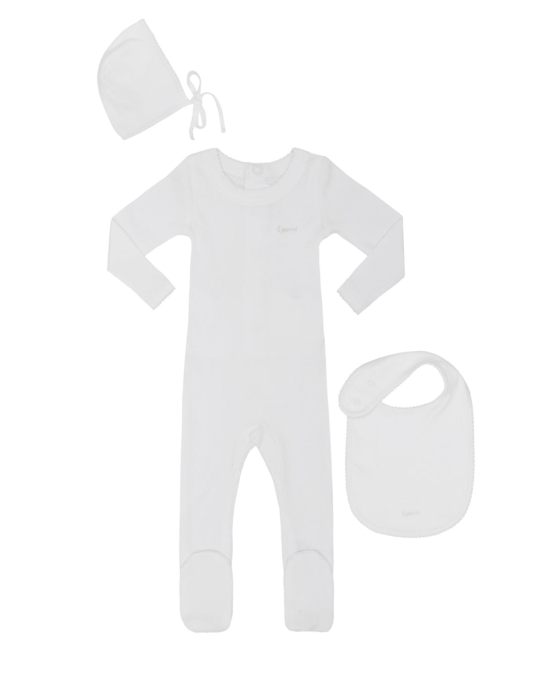 White baby onesie with bonnet and bib on a white background