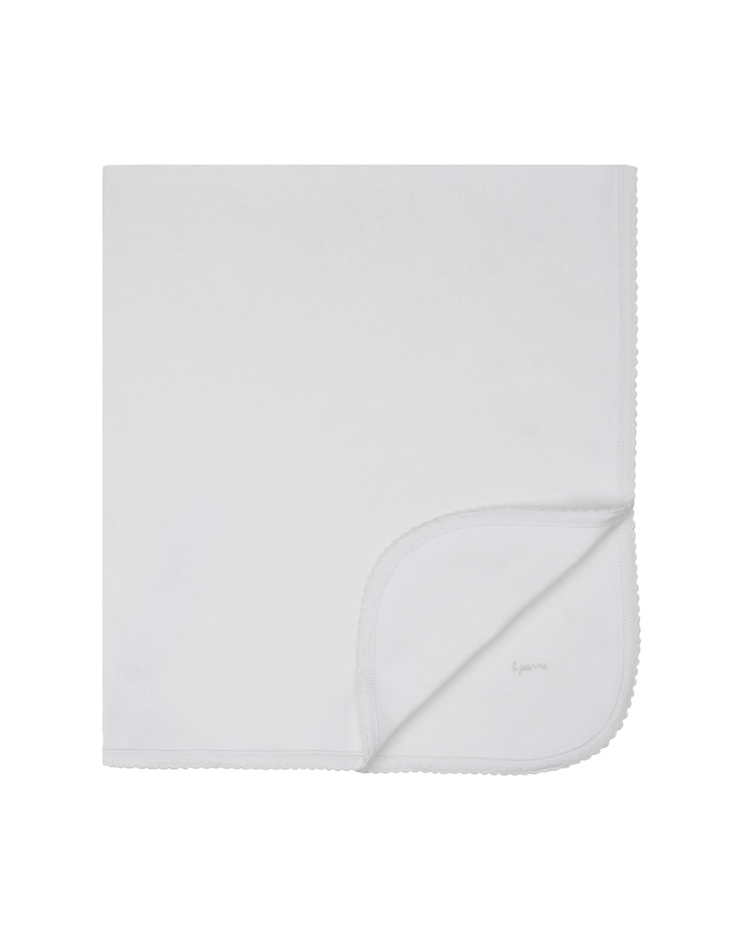 White blanket with a brand logo on a white background