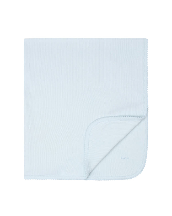 Light blue blanket on a white background