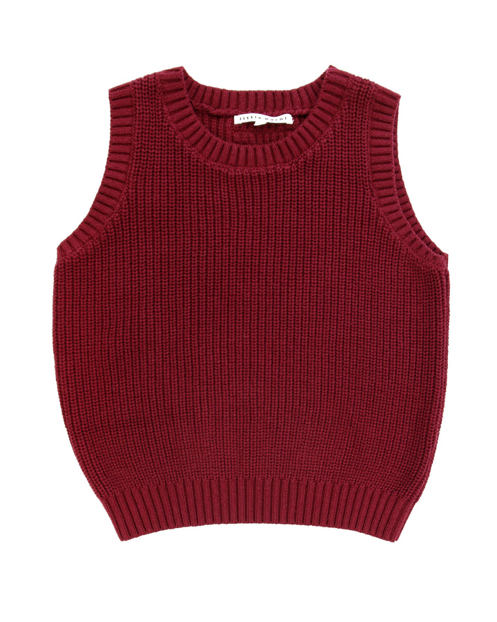Red knitted vest on a white background