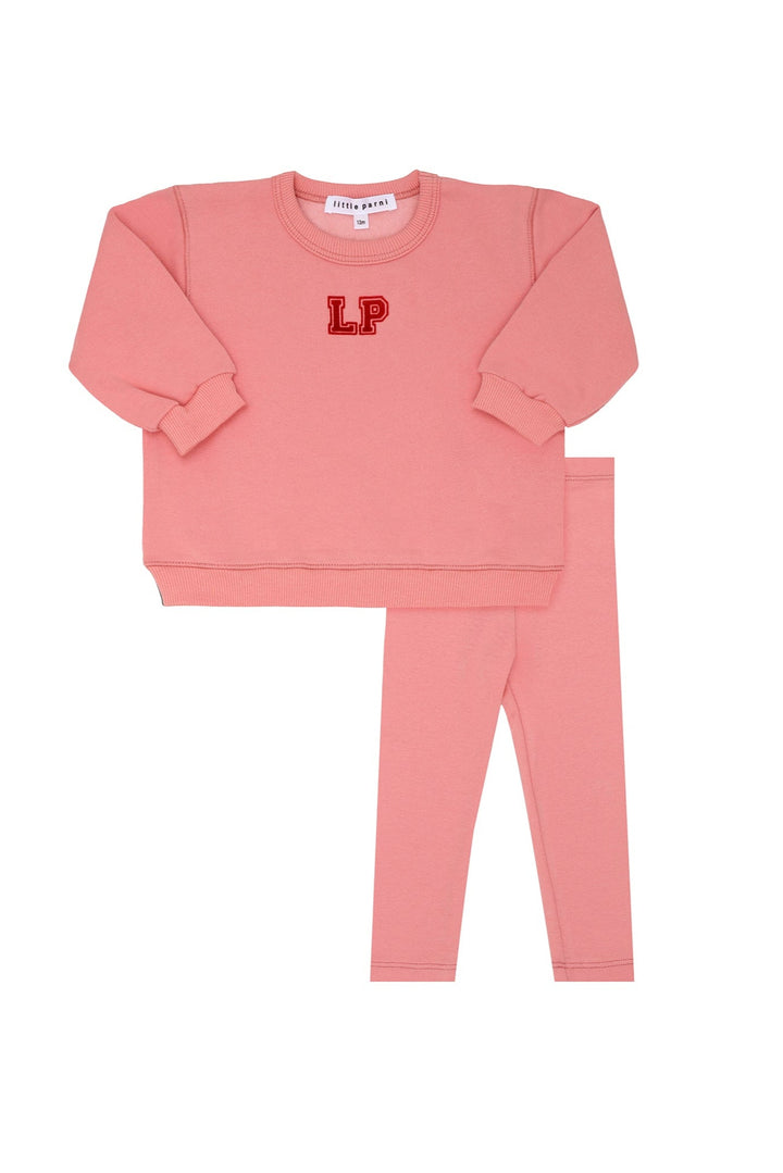 Pink sweatshirt set with 'LP' logo on a white background