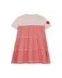 Red and white striped dress with a beige top on a white background