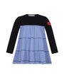 Dress with black long-sleeve top and blue striped skirt on a white background