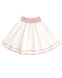 White skirt with red embroidery on a white background