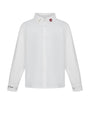 A white long-sleeve button-up shirt with a pointed collar, featuring a small red embroidered heart on the right collar and 'E. Jean Paul' embroidered in black on the left cuff, displayed on a clean white background.