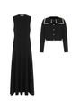 A black sleeveless maxi dress shown next to a matching black cropped cardigan with a white contrast collar and white buttons, displayed on a clean white background.