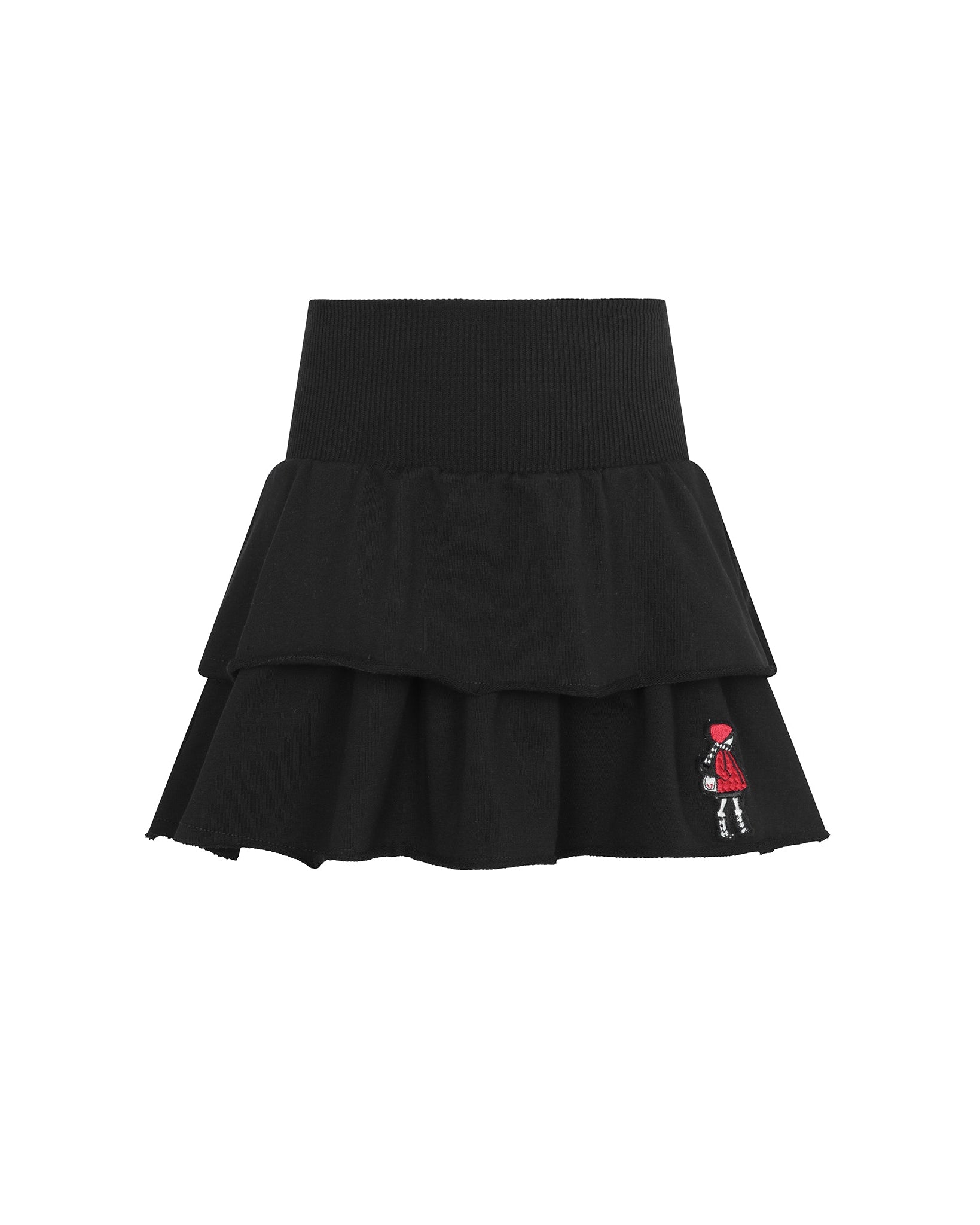 A black tiered ruffle mini skirt with a ribbed waistband and a small embroidered cartoon character on the lower right hem, shown against a plain white background.