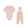 A two-piece baby clothing set in a soft dusty pink color, featuring a long-sleeve bodysuit with a Peter Pan collar on the left and matching corduroy-style pants with shoulder straps on the right, laid flat against a white background.