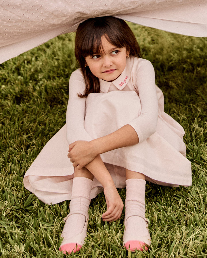 Girl wearing the Girls Sleeveless Collared Dress and T-Shirt Set in Pink.