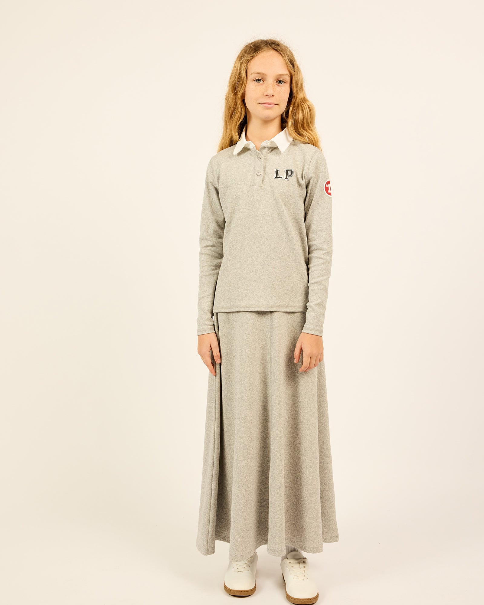 model wearing the teen Teen Maxi Skirt in grey.