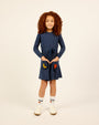 Model wearing the LP Pocket Dress in blue.