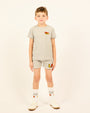 Boy wearing the Boys' LP Track Shorts in grey.