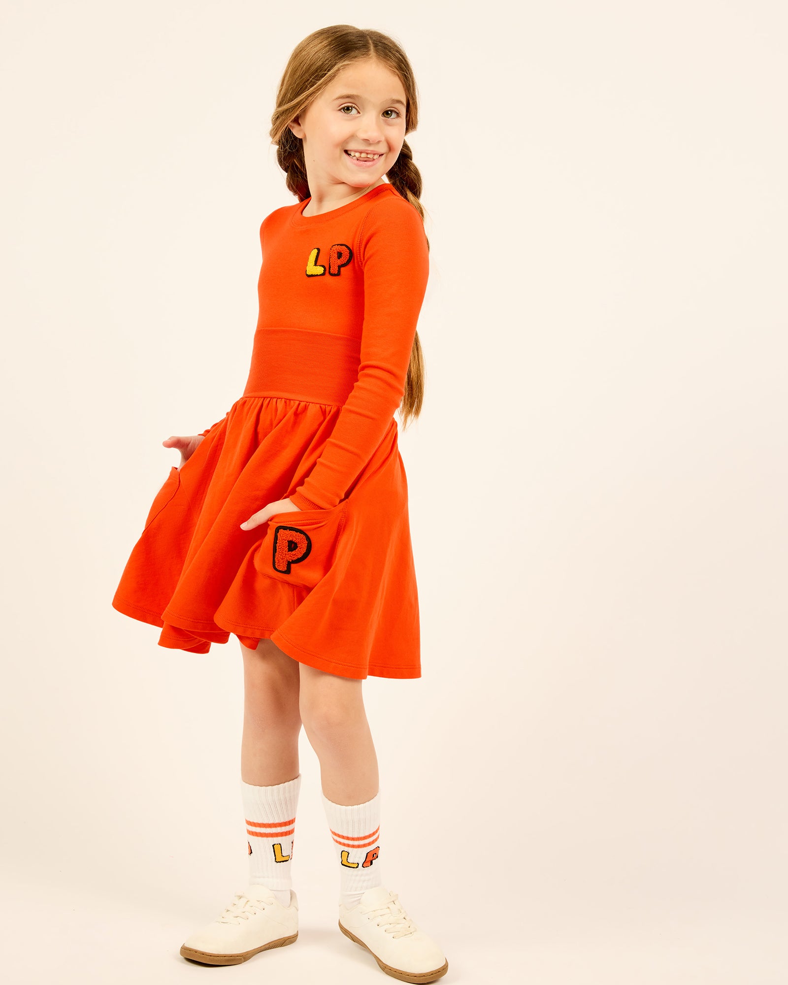 Orange Girls High Waisted Varsity Skirt.