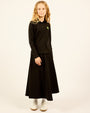 model wearing the black Teen Maxi Skirt.