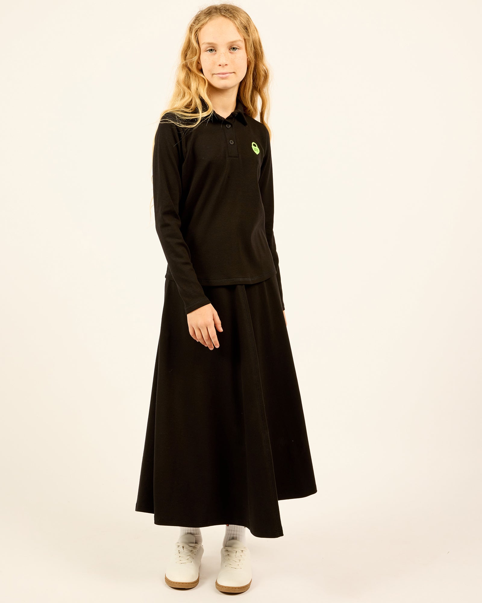 model wearing the black Teen Maxi Skirt.