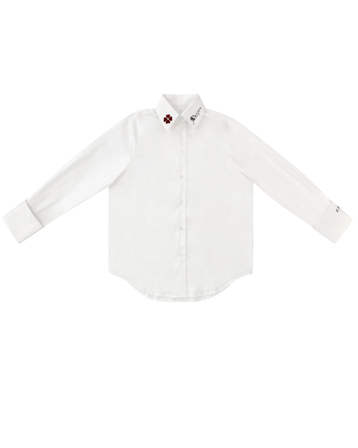 White dress shirt with a small floral pattern on a white background