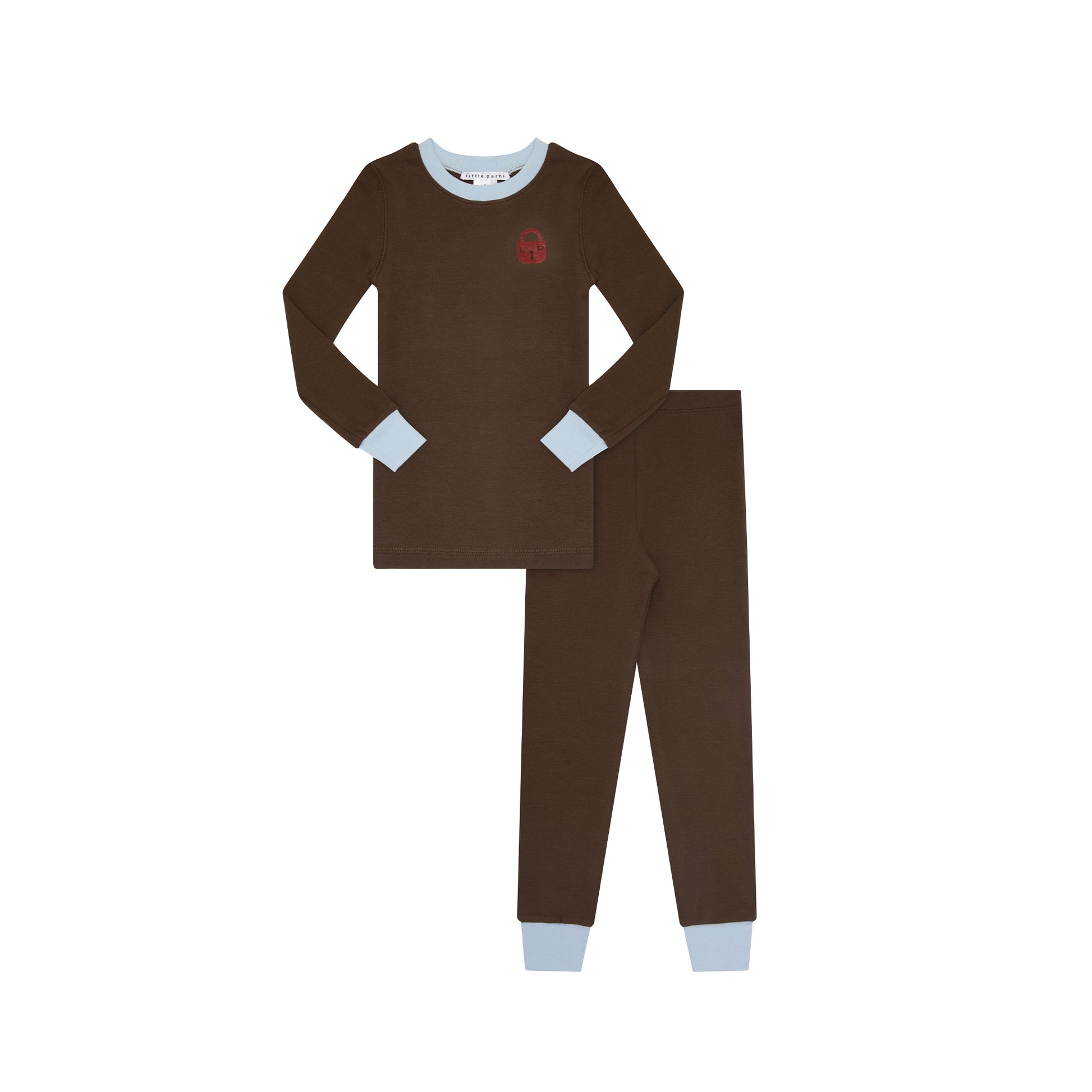 A two-piece children's pajama set in dark brown, featuring a long-sleeve top with light blue cuffs and collar, and matching brown pants with light blue cuffs. A small red shield logo is on the chest.