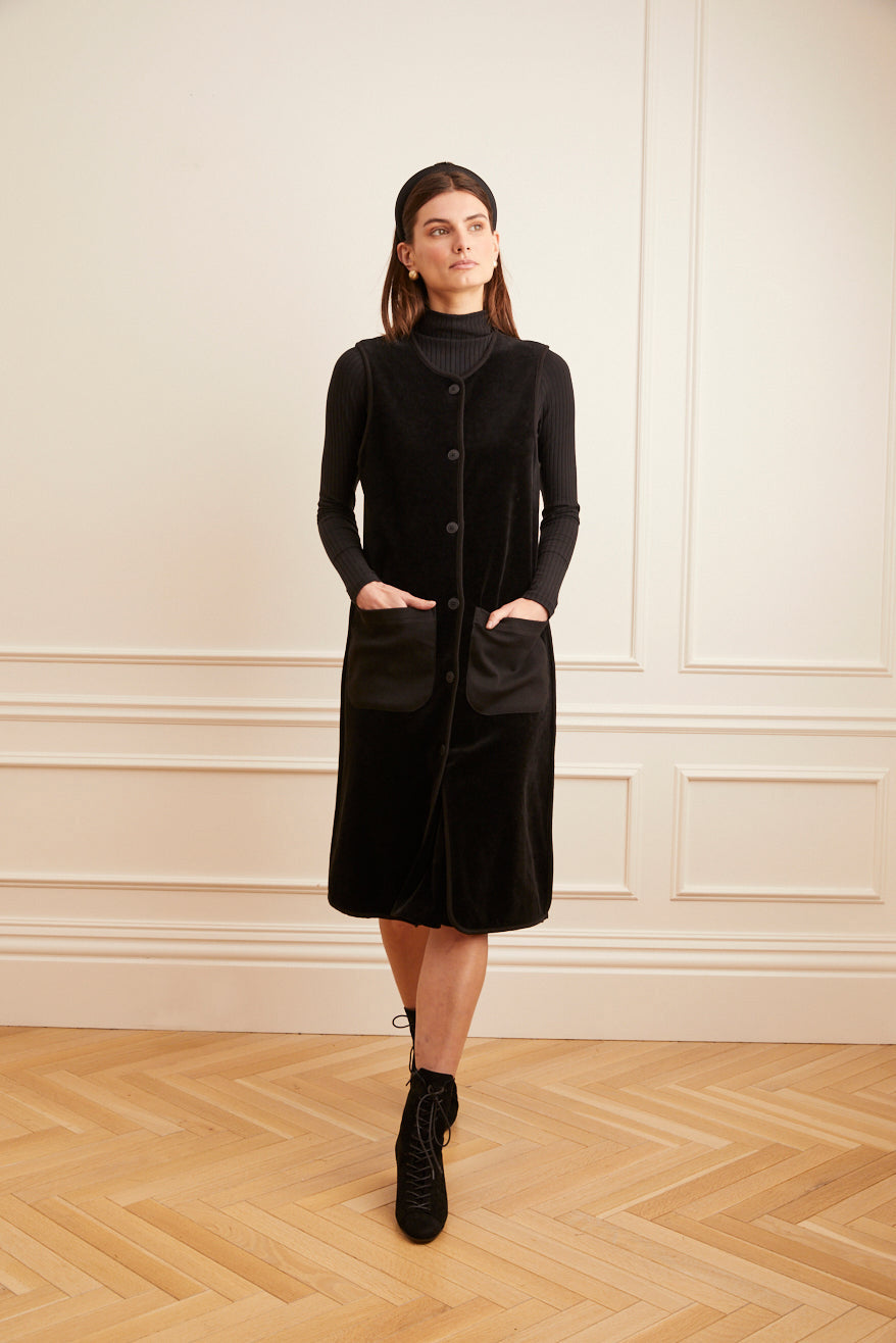 Model wearing the black Sleeveless Velour Cardigan.