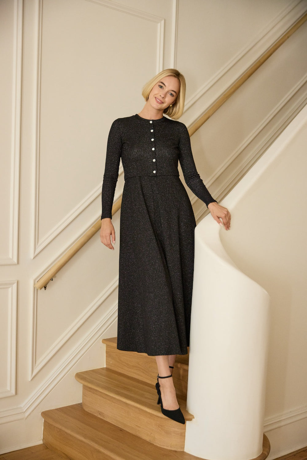 Woman wearing the Lurex Maxi Sleeveless Jumper.