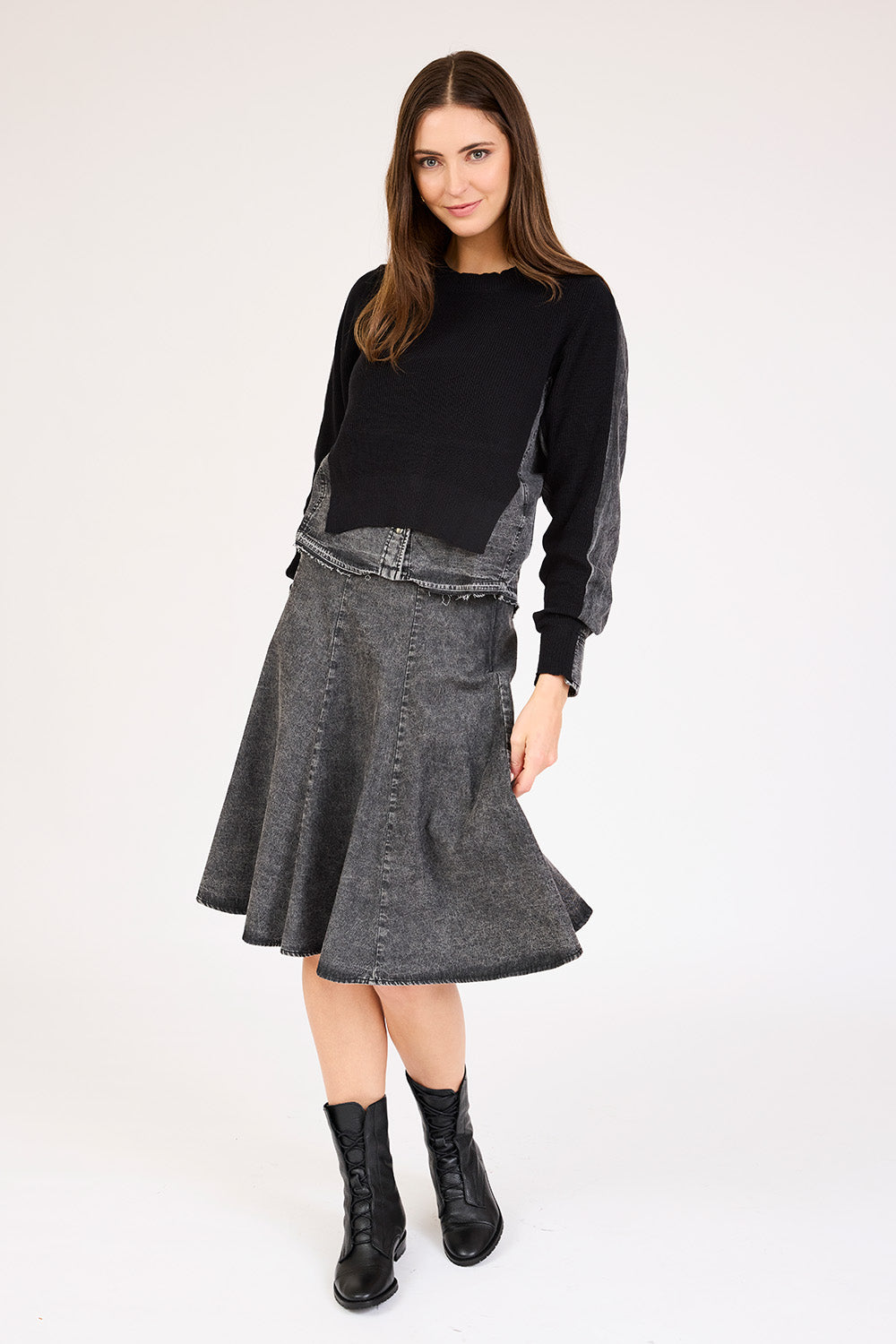 Woman wearing the Short Denim Circle Skirt in Black.