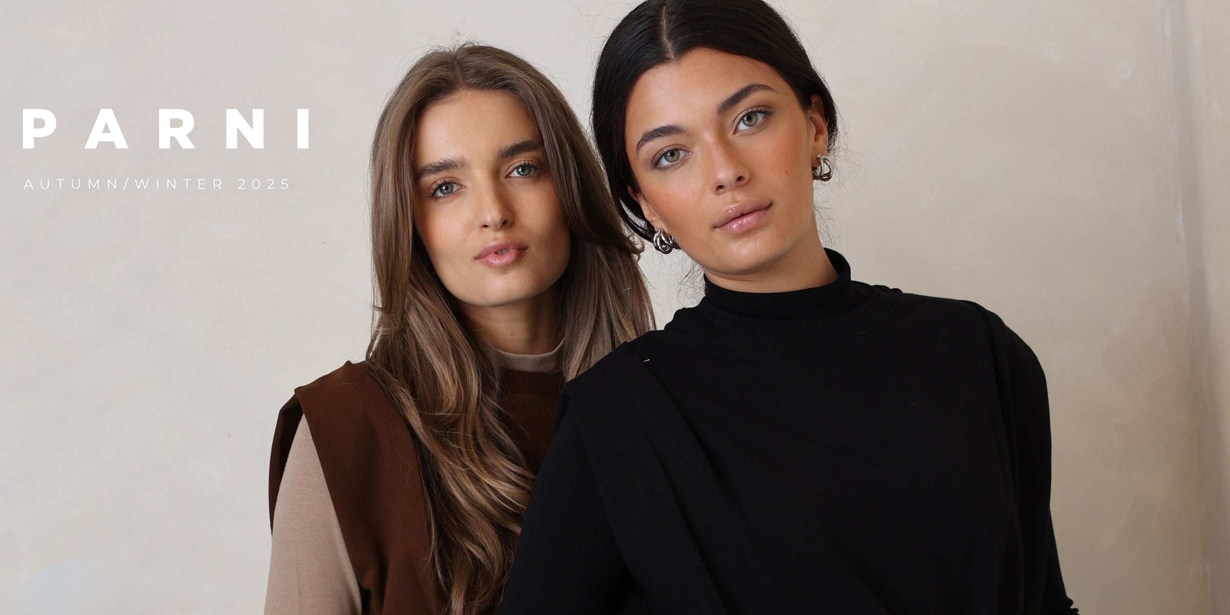 Two women standing side by side with 'Parni' branding in the background