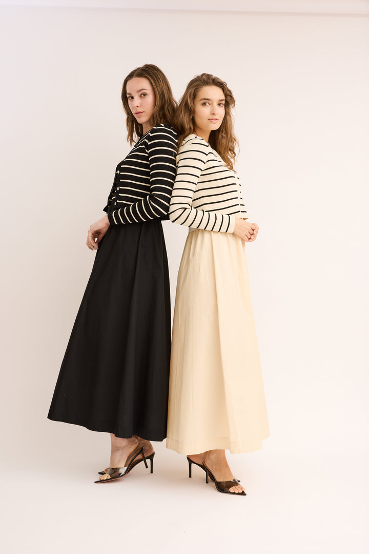 Models wearing the Mix Media Striped Cotton Dress & Cardigan Set in ivory and black.