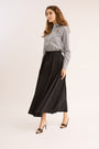 model walking in the Relaxed Cotton Drawstring Skirt.