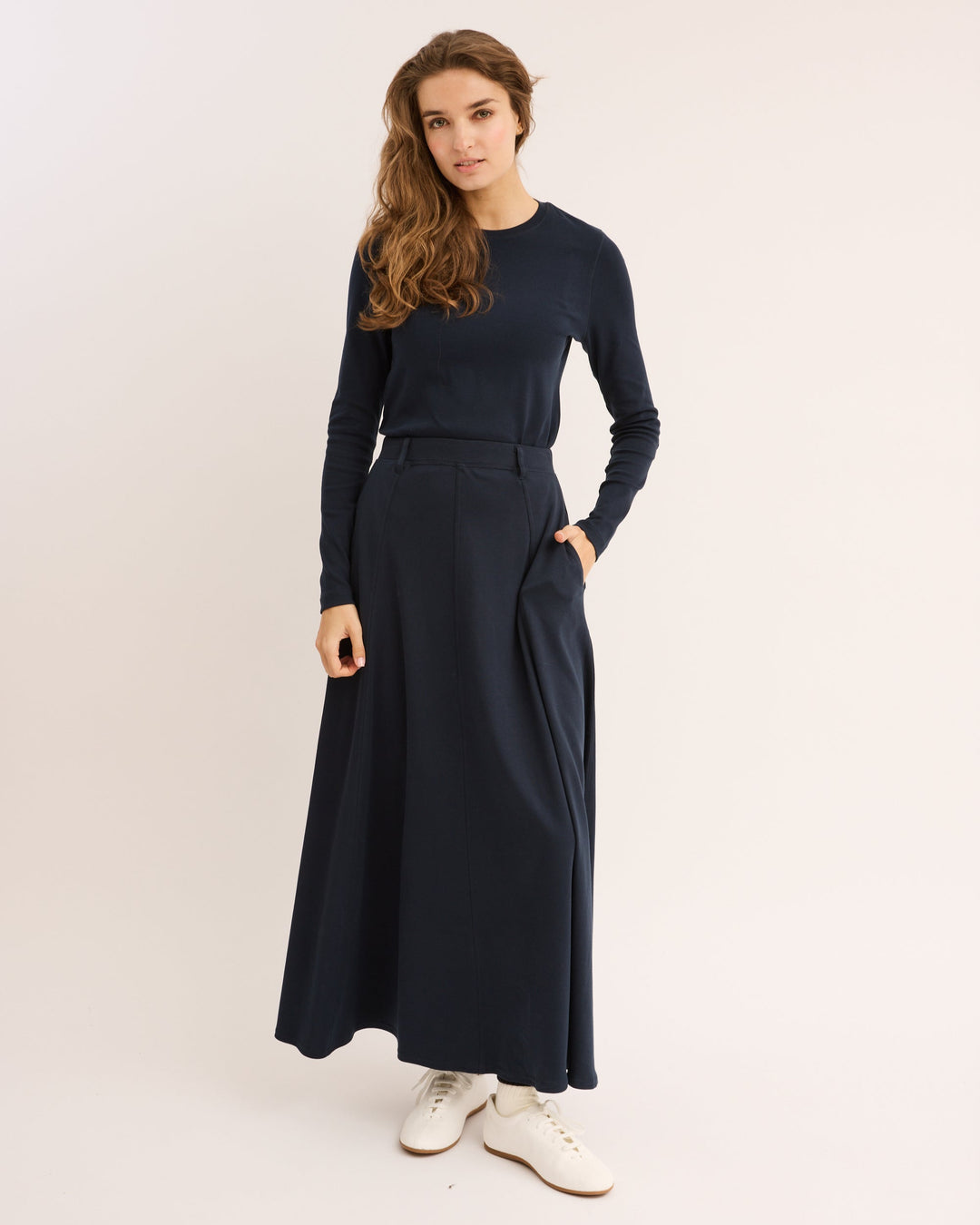 Model wearing the Navy Pima Paneled Skirt.