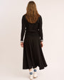 Model showing the back of the High Waisted Panel Skirt in Black.