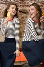 Two woman, one wearing the Everyday Pima Short Skirt.