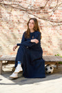 Model wearing the navy High Waisted Panel Skirt.