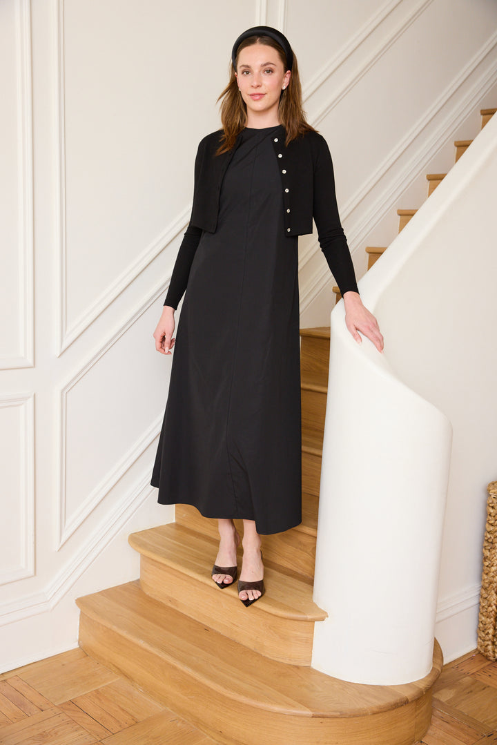 Woman wearing the Maxi Jumper Cardigan Set. 