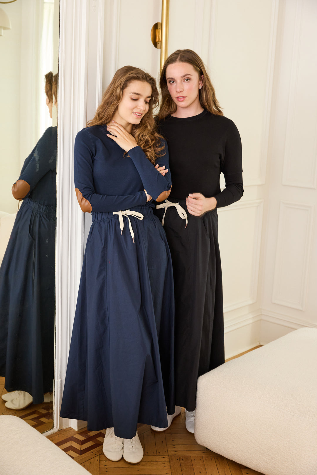 Women wearing the Navy and Black The Perfect Twill Drawstring Skirts.