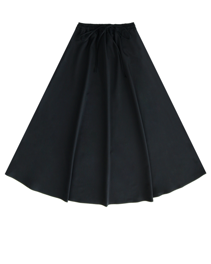 Black skirt with tie at waist on a white background.