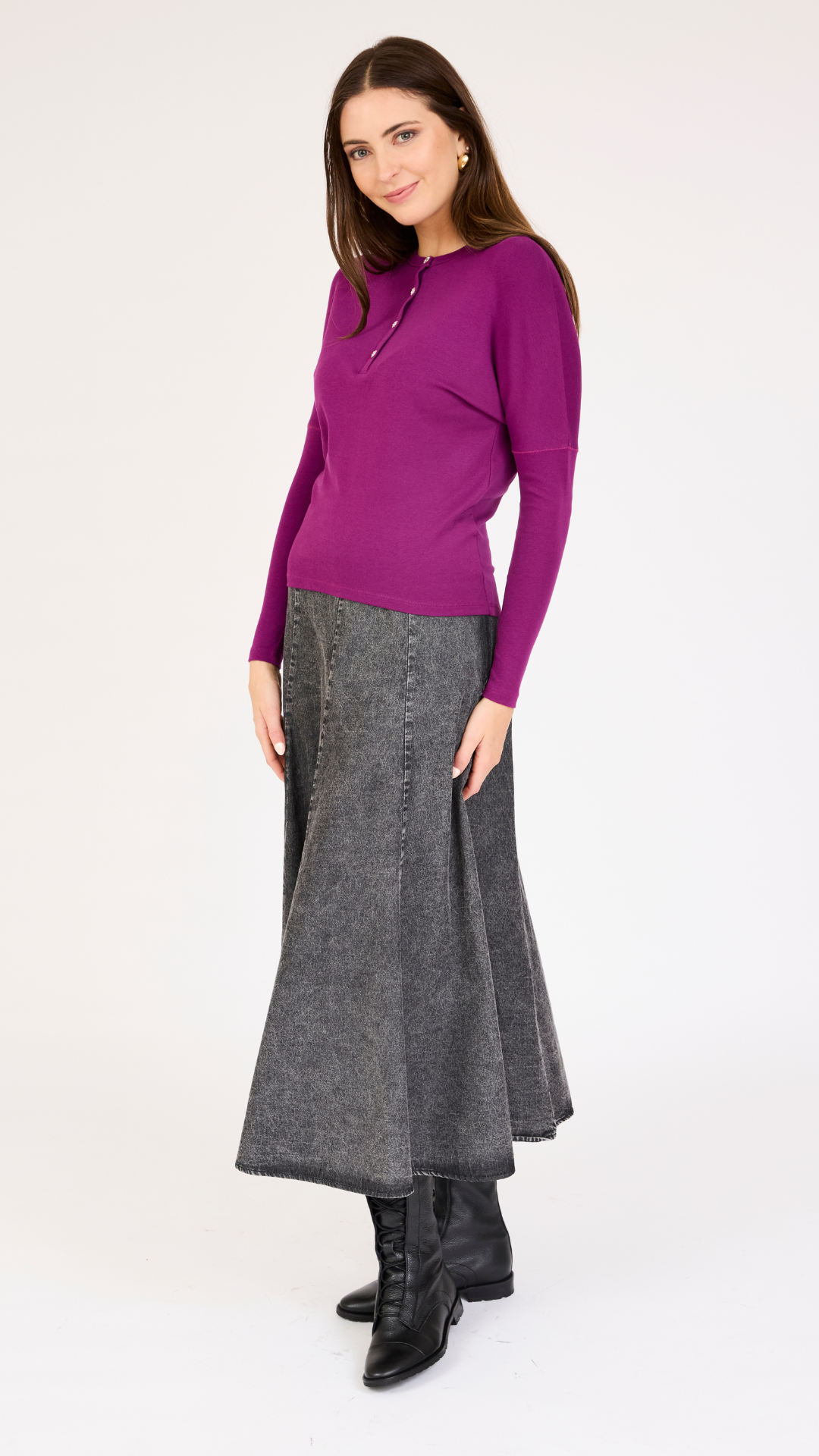 Model wearing the Rhinestone Henley Dolman Sleeve Top in Megenta.